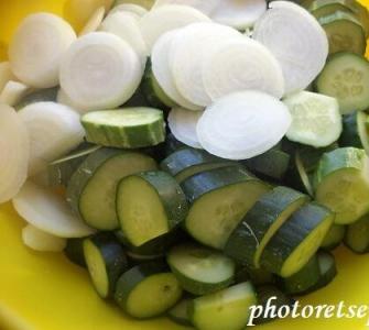 Sliced ​​cucumbers for the winter / Recipe with step-by-step photos